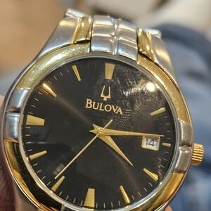 Bulova Black Dial Watch with Gold and Silver Accents